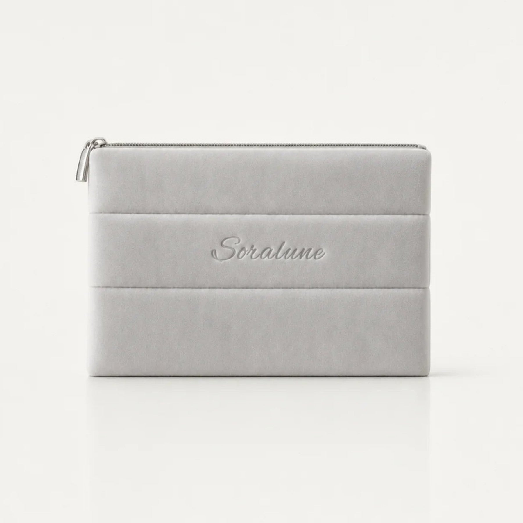 Puffy Beauty Bag on a seamless off-white background
