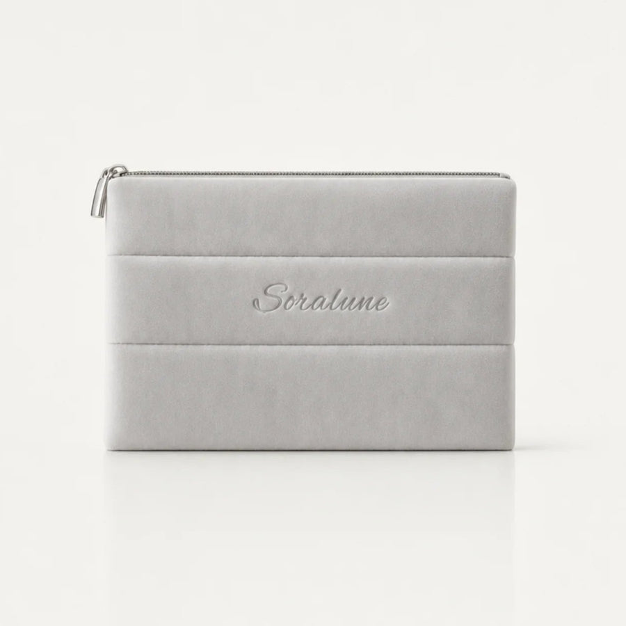 Puffy Beauty Bag on a seamless off-white background