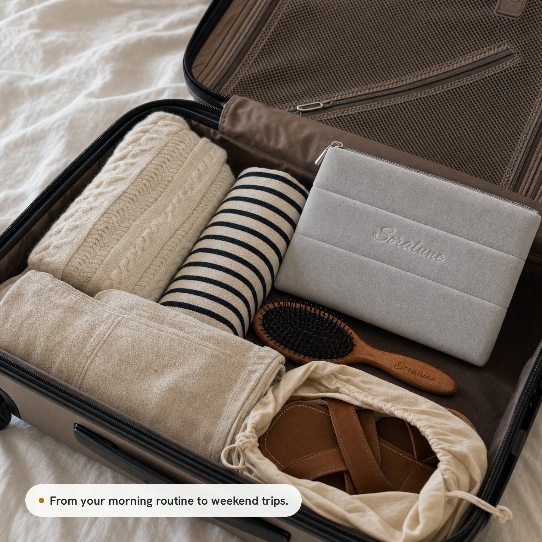 Puffy Beauty Bag packed in a suitcase for a weekend trip